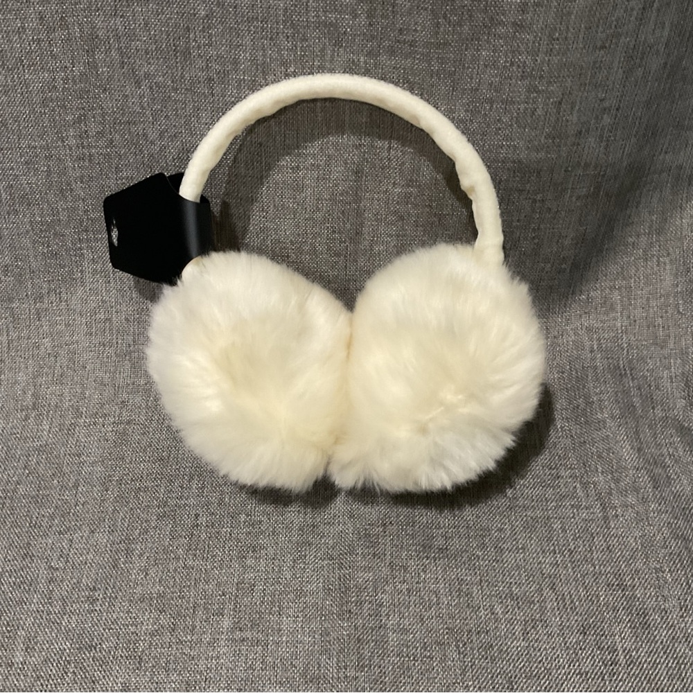 Off white fuzzy earmuffs
